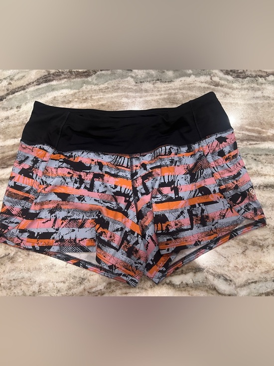 lululemon athletica Pants - RARE lululemon athletica Hotty Hot shorts ll *Long 4” LIKE NEW Sz 4